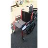 Image 2 : Red & black wheelchair.