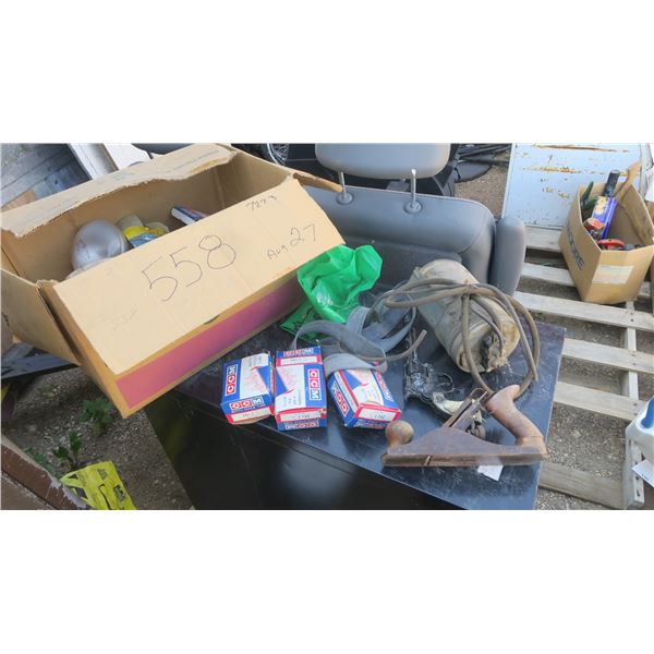 box of misc tools, bike tubes, locks.