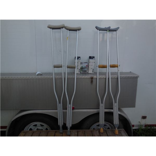 2 sets of crutches / box of crutch pads & feet