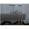 Image 1 : 2 sets of crutches / box of crutch pads & feet