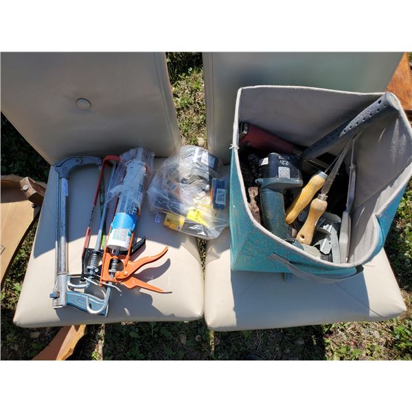various tools - saws, caulking gun, drill & hardware