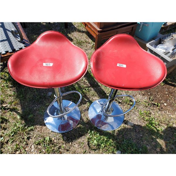 2 red bar stools
