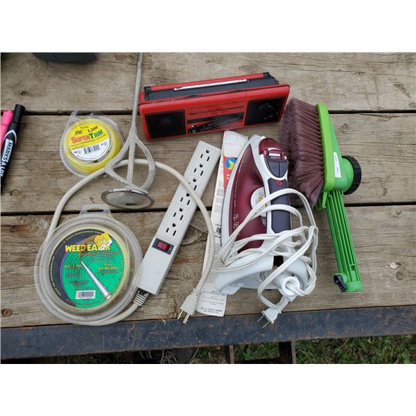 radio, iron, power bar, weedeater line, carwash brush
