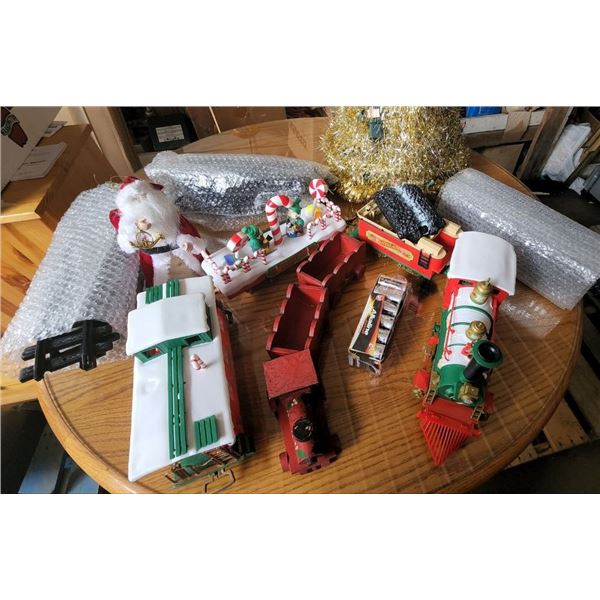 Lot of Christmas Trains, 1 battery powered Train, 1 Wooden Train set, Plus Christmas Décor