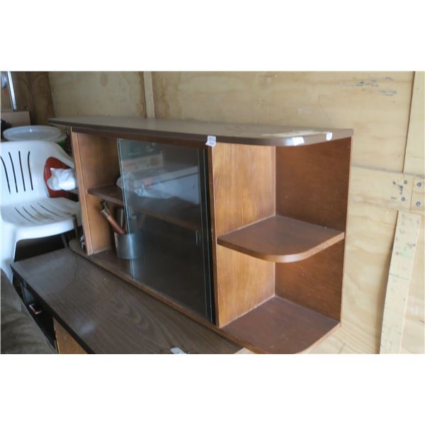 wood & glass TV stand with legs.