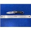 Image 2 : Buck Black and Grey Locked Blade folding pocket knife with clip and bottle opener