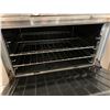 Image 4 : Garland Industrial 72 inch gas range with double oven, griddle and quad burners