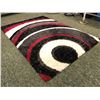 Image 1 : Multi coloured shag area rug - Approx 5ft x 8ft (From the superhero show)