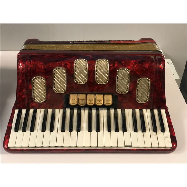 Vintage red accordion (From the superhero show)