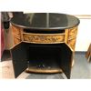 Image 2 : Black marbel top painted oval cabinet (From the horror drama show)