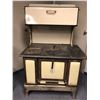 Image 1 : Early 1900s Enamel finish wood cook stove (From the horror drama show)