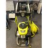 Image 1 : Ryobi 3000 psi pressure washer w/ Honda engine & extra hose line (From the superhero show)