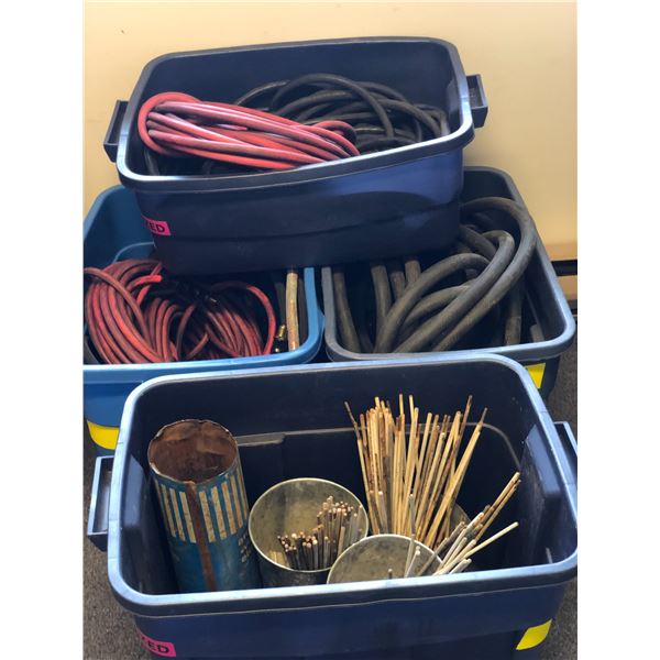 4 rubber made containers of assorted hose lines / welding electrodes etc (From the superhero show)