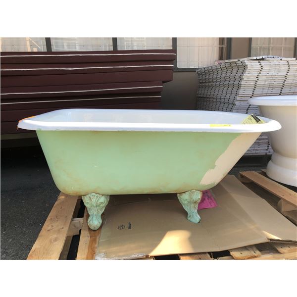 White enamel finish heavy cast iron claw foot bath tub (From the thriller show)