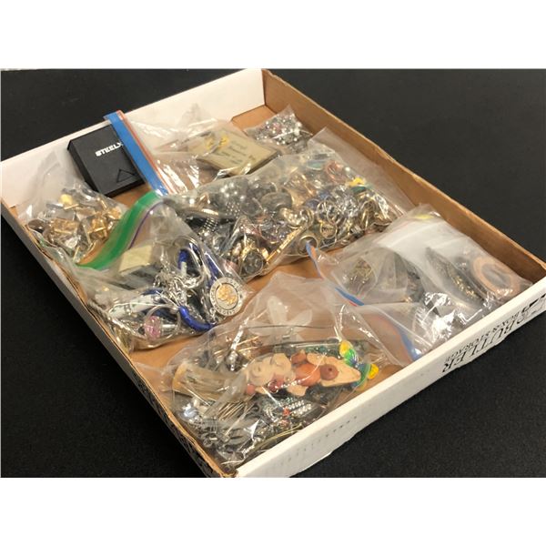 Box lot of vintage jewelry from the show - includes rings/earrings/cuff links/hair clips/key chains 