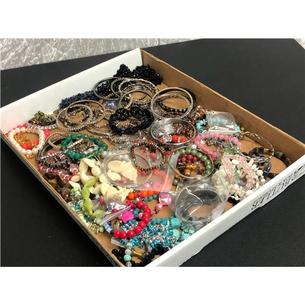Box lot of vintage jewelry from the show - includes mostly bracelets - approx. 80 pcs