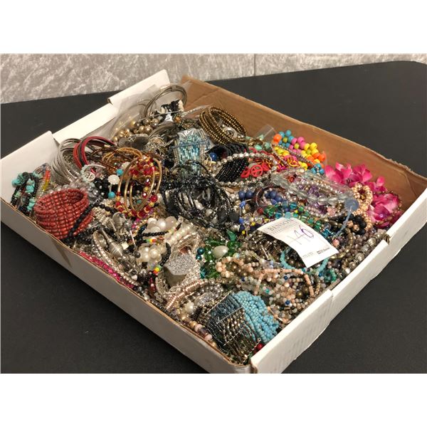 Box lot of vintage jewelry from the show - includes mostly bracelets - approx. 146 pcs
