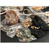 Image 2 : Box lot of vintage jewelry from the show - includes mostly necklaces - approx. 80 pcs