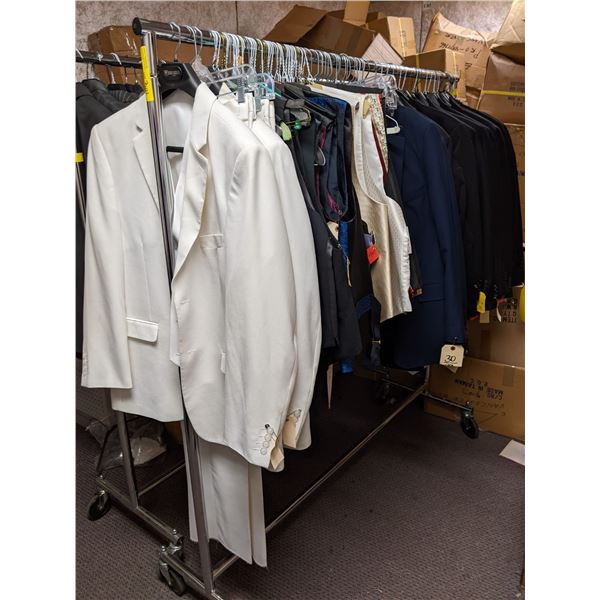 "Superhero Show" - Rack of assorted screen worn wardrobe - includes black suit jackets/vests/navy su