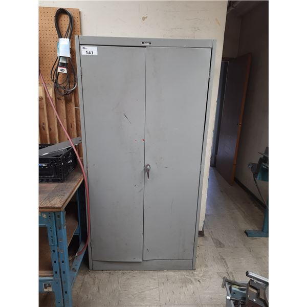 GREY METAL 2 DOOR STORAGE CABINET AND REMAINING CONTENTS