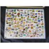 Image 2 : Multiple Collectible Pins: Places, Sports, Animals, Ads, etc in Display Case 16"L
