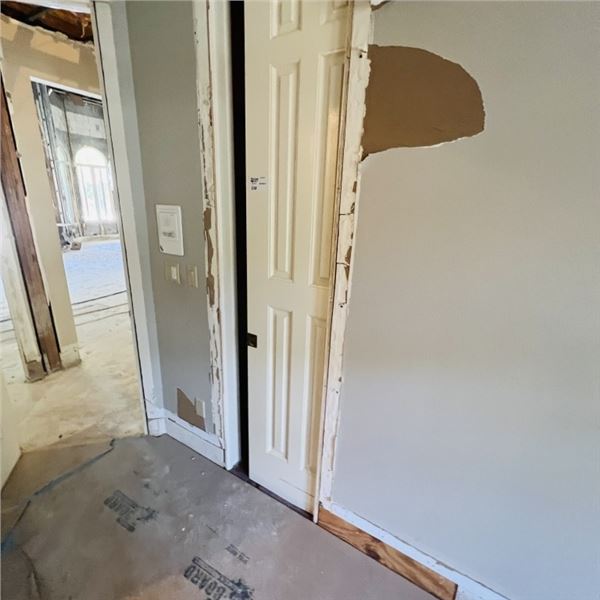 SOLID WOOD POCKET DOOR POSSIBLY NO FRAME DOOR APPROX 23.25" X 95.25" SEE PHOTOS ITEMS WILL BE REMOVE