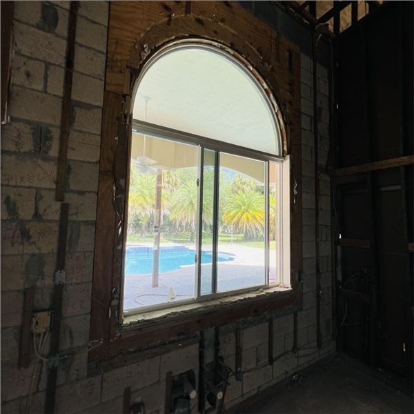 PGT IMPACT WINDOW WITH ARCH TOP WINDOW APPROX 69" X 56.75" ARCH APPROX 69" X 39"  SEE PHOTOS ITEMS W
