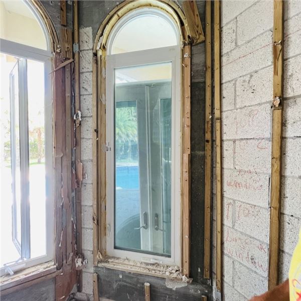 PGT IMPACT WINDOW WITH ARCH TOP WINDOW APPROX 71" X 27.25" ARCH APPROX 16" X 27.25"  SEE PHOTOS ITEM