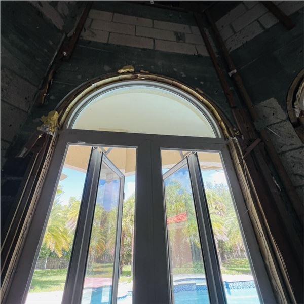 PGT IMPACT WINDOW WITH ARCH TOP WINDOW APPROX 40.25" X 71" ARCH APPROX 22" X 40.25"  SEE PHOTOS ITEM