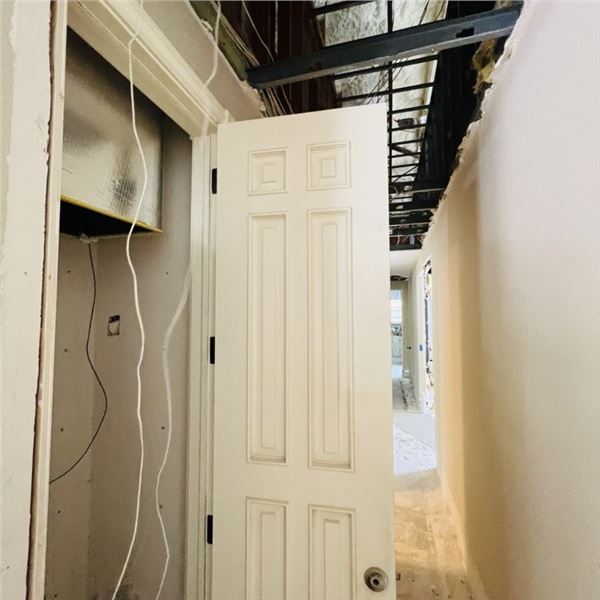 SOLID WOOD  DOOR WITH FRAME DOOR APPROX 26." X 95." SEE PHOTOS ITEMS WILL BE REMOVED AND READY FOR P