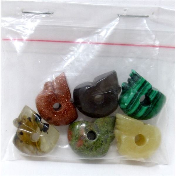 6 Hand-Carved Gemstone Skulls - 163 Carats
