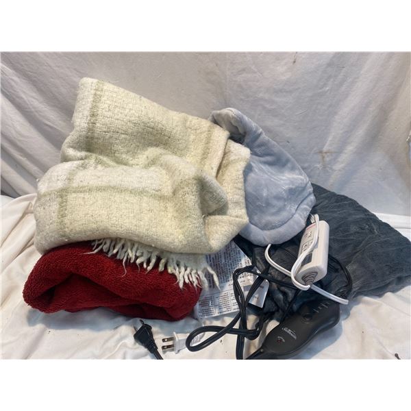 Two sunbeam  heating pads and two throw blankets