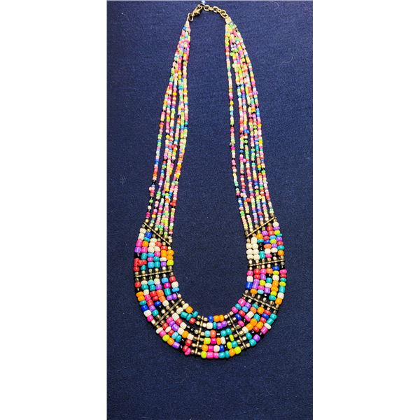 1)  MULTI COLORED 6 STRAND BEAD NECKLACE WITH