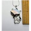 24)  TIBETAN SILVER AND OPALINE FOX PENDANT ON