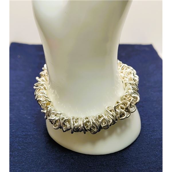 4)  LINKED CHAIN DESIGN BRACELET  WITH STRETCH