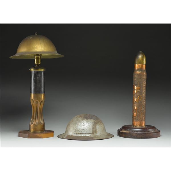 2 WWI SHELLS CONVERTED TO LAMPS & HELMET.