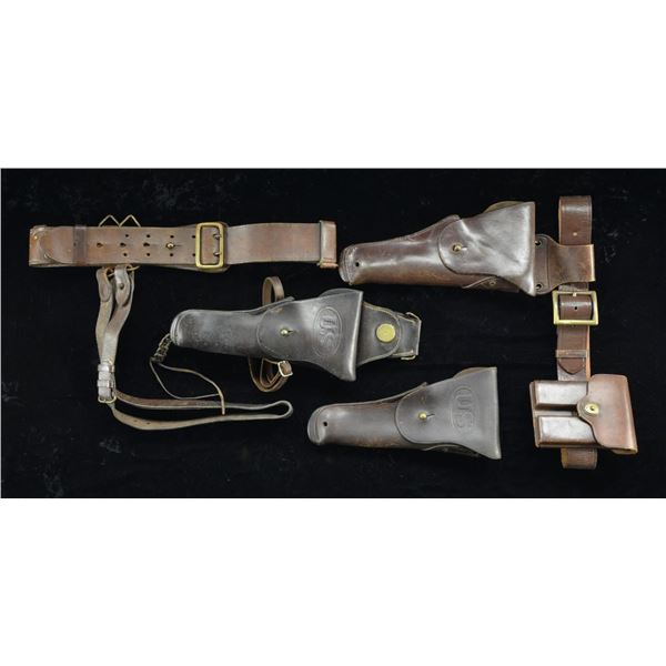 3 US 1911 HOLSTERS & 1 US SAM BROWNE BELT.