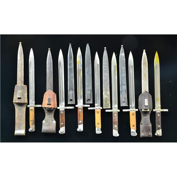 7 MODEL 1895 MANNLICHER BAYONETS & SCABBARDS.