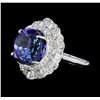 Image 1 : 14.11 ctw Round Brilliant Tanzanite And Baguette Cut (Tapered) Diamond Ring - 18