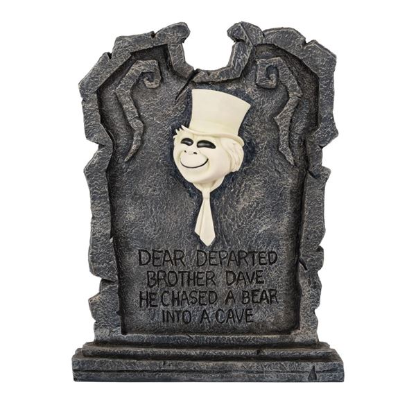 Haunted Mansion Brother Dave Illuminating Tombstone.