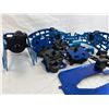 Image 2 : RC Car parts and chassis pieces in blue