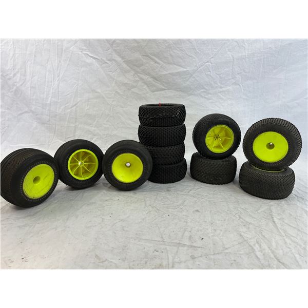 11 mixed RC Car tires with and without rims.