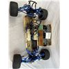 Image 1 : partially assembled Gasoline RC car and box of parts