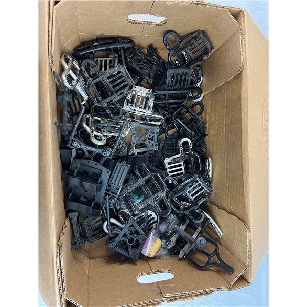 Mixed lot of RC car bumpers and parts