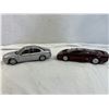 Set of 2- 1/18 scale die cast Jaguar Cars