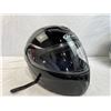 Image 13 : Three motorcycle helmets and riding jacket