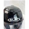 Image 14 : Three motorcycle helmets and riding jacket