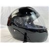 Image 17 : Three motorcycle helmets and riding jacket