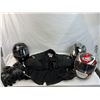 Three motorcycle helmets and riding jacket