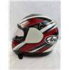 Image 22 : Three motorcycle helmets and riding jacket